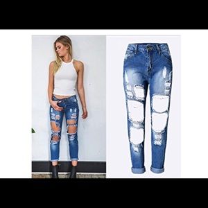 Distressed denim jeans